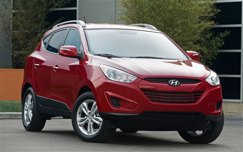 2012 Hyundai Tucson kırmızı gövde ön çapraz görünüm