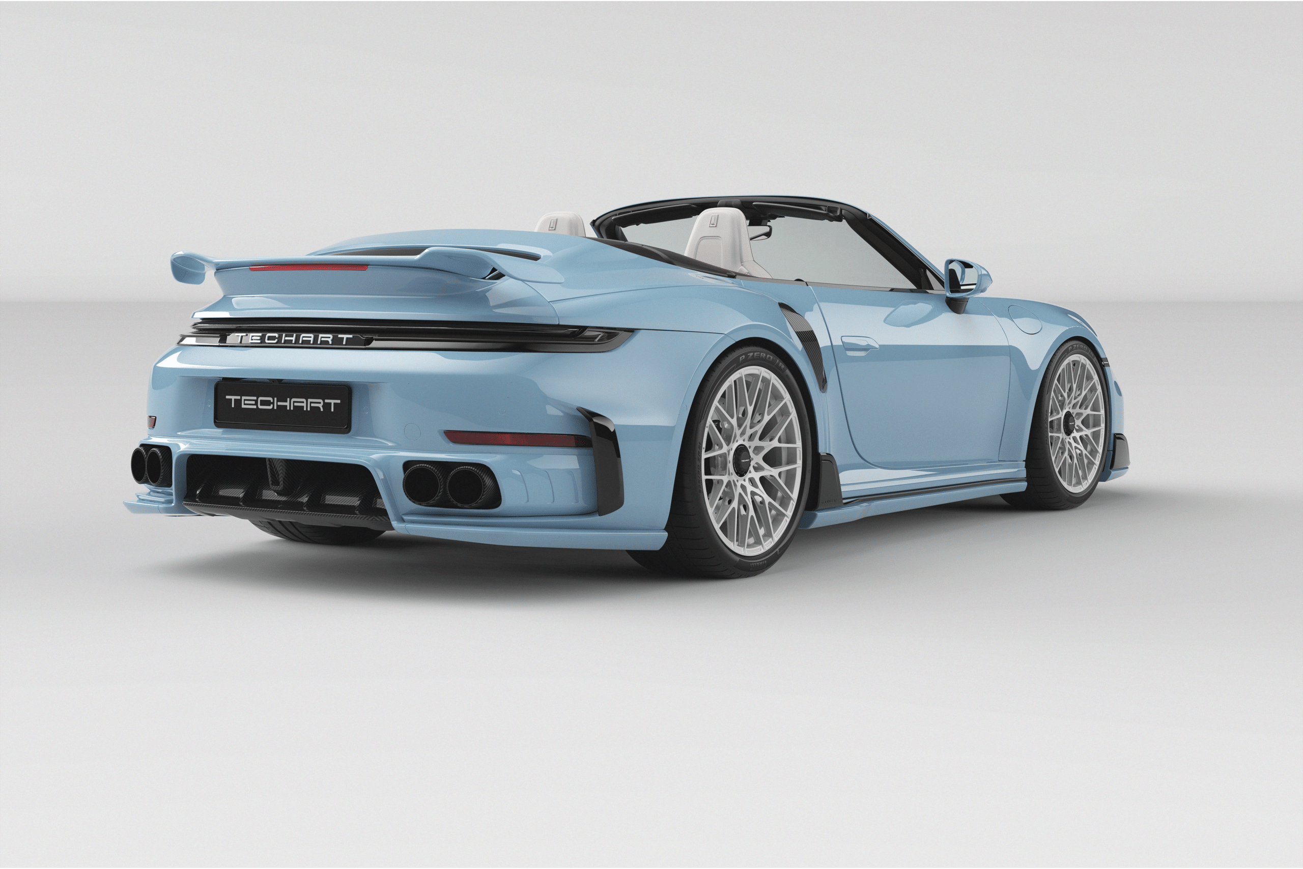 Açık mavi TECHART 911 Turbo S Cabriolet arka üç çeyrek görünümü